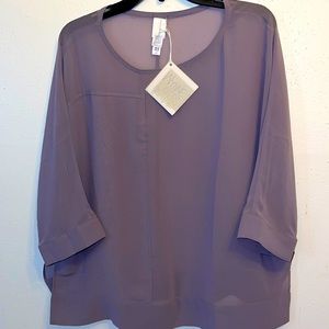 Woman’s Top. Elegant and sheer. Size: M. Color: lavender